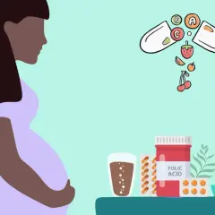Femme enceinte tenant son ventre, avec une capsule ouverte et des fruits, et une boîte de complément alimentaire femme enceinte.