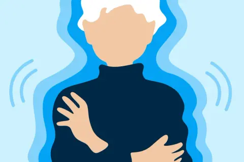 Person se serre les bras, le corps entouré d'ondes bleues, évoquant une sensation de froid soudaine.