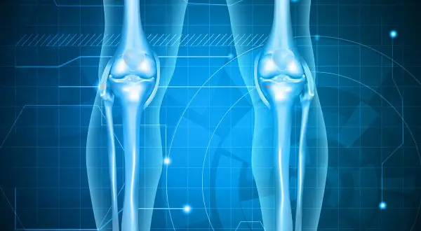Anatomie des genoux bleus lumineux sur fond technologique. Aide à visualiser la douleur hanche et genou marche.
